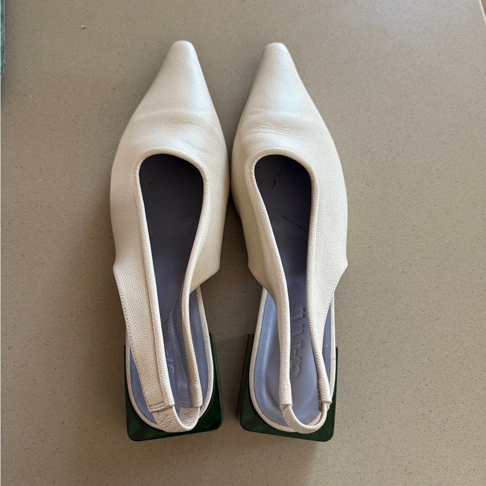 Ganni white heels with fun emerald base